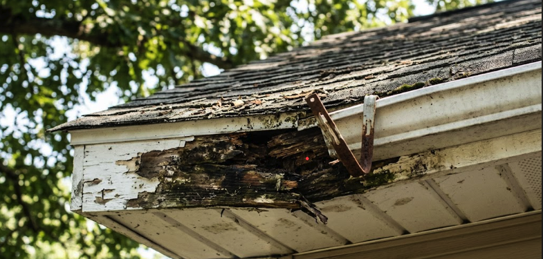 Localized roof damage before repair by Parker Roofing