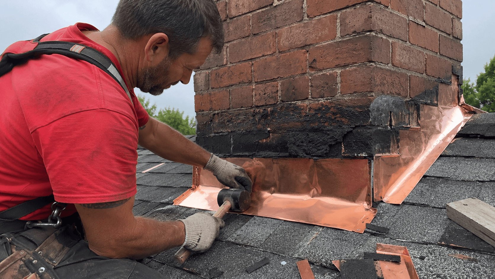 Parker Roofing crew completing chimney repair work on a Cincinnati home